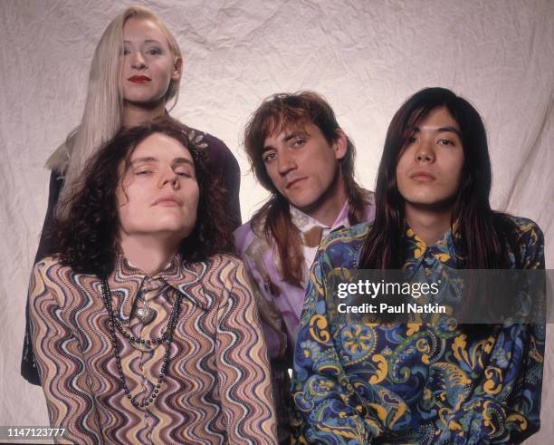 Portrait of the members of American Rock group Smashing Pumpkins as they pose in a photo studio, Chicago, Illinois, May 10, 1991. Pictures are, from...