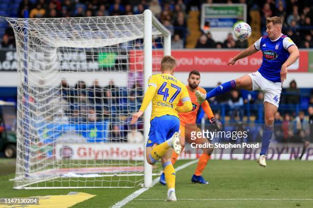 James Bree of Ipswich Town clears the ball after a shot from Jack Clarke of Leeds United during the Sky Bet Championship match between Ipswich Town...