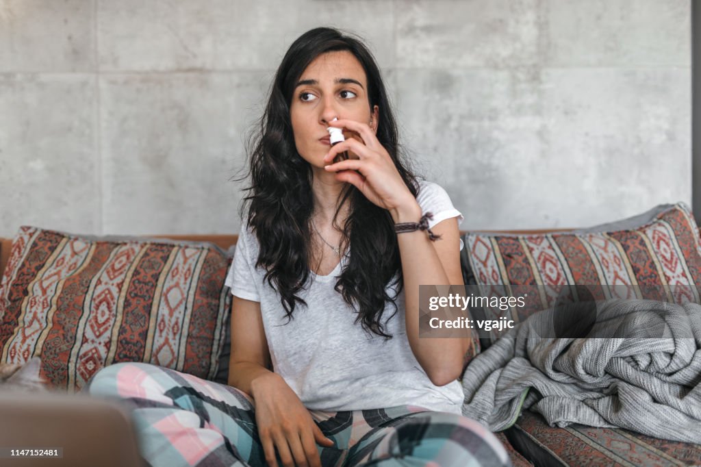 Young Woman Sick At Home