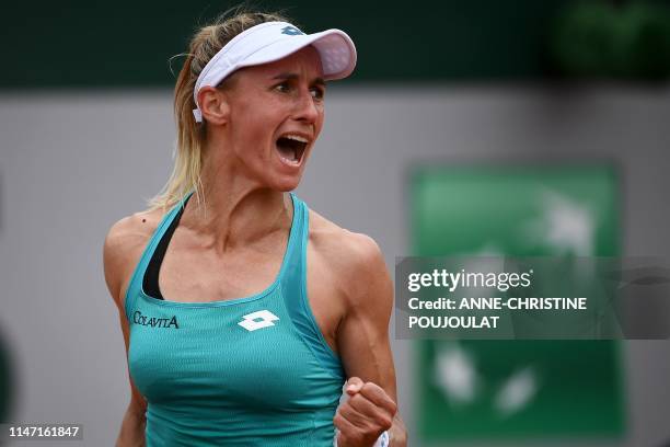 Ukraine's Lesia Tsurenko celebrates after winning against Serbia's Aleksandra Krunic after winning their women's singles third round match on day six...