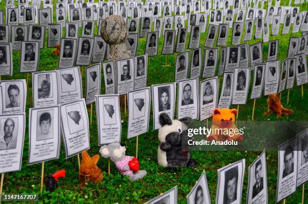 Pictures of the victims and toys symbolized the 102 children who were killed in wartime by Serbs in city of Prijedor are being displayed during White...