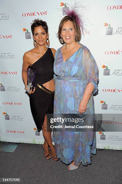 Award winner Halle Berry and President of the Fragrance Foundation Rochelle Bloom pose backstage at the 2011 FiFi Awards at The Tent at Lincoln...