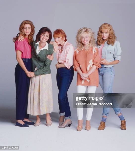 Steel Magnolias actresses Julia Roberts, Sally Field, Shirley MacClaine, Dolly Parton, and Daryl Hannah pose for a portrait in October 1989 in Los...
