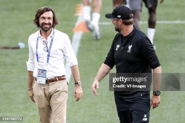 Andrea Pirlo, Liverpool FC coach Jurgen Klopp during a training session prior to the UEFA Champions League final match between Tottenham Hotspur FC...