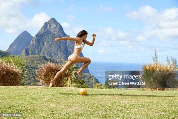 Swimsuit Issue 2019: Soccer player Alex Morgan poses for the 2019 Sports Illustrated swimsuit issue on March 12, 2019 in Saint Lucia. CREDIT MUST...