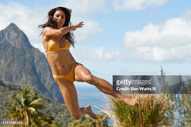 Swimsuit Issue 2019: Soccer player Alex Morgan poses for the 2019 Sports Illustrated swimsuit issue on March 12, 2019 in Saint Lucia. CREDIT MUST...