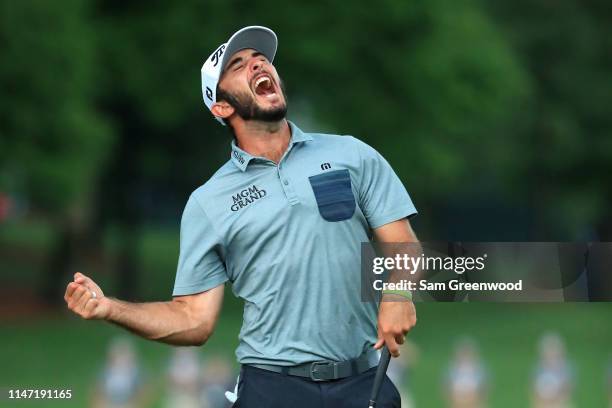 Max Homa celebrates on the 18th green after making his par putt to win the 2019 Wells Fargo Championship at Quail Hollow Club on May 05, 2019 in...