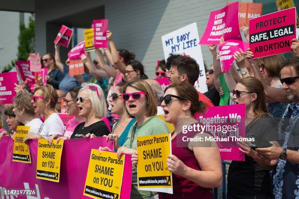 Pro-Choice supporters, along with Planned Parenthood staff celebrate and rally outside the Planned Parenthood Reproductive Health Services Center on...