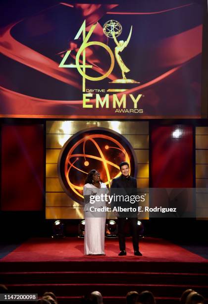 Hosts Sheryl Underwood and Mario Lopez speak onstage at the 46th annual Daytime Emmy Awards at Pasadena Civic Center on May 05, 2019 in Pasadena,...