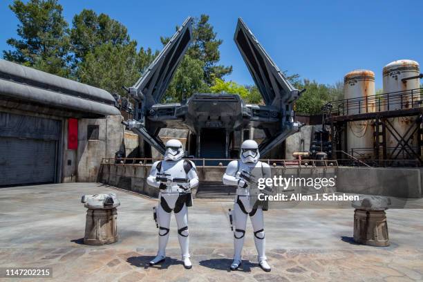 Storm Troopers patrol The First Order Outpost where the Tie Echelon fighter ship is parked as media members get a preview during the Star Wars:...