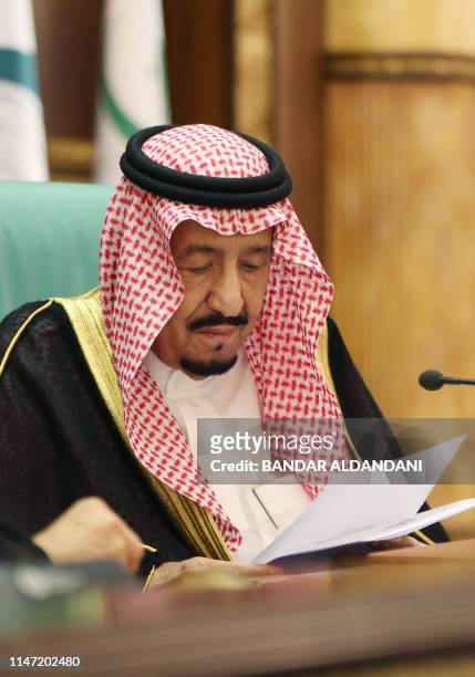 Saudi King Salman bin Abdulaziz addresses the opening session of a summit of the 57-member Organization of Islamic Cooperation in the Saudi holy city...