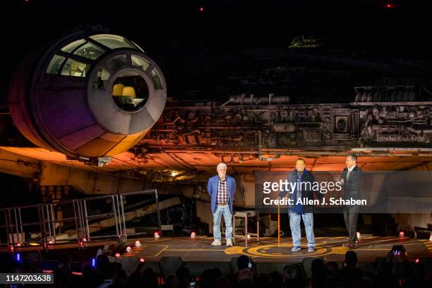 Bob Iger, right, CEO of The Walt Disney Company, and George Lucas, left, Star Wars creator, listen to Billy Dee Williams, the actor who played Lando...