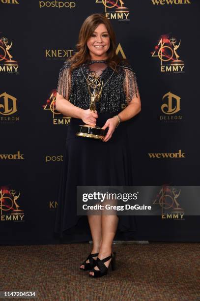Rachael Ray poses with the Daytime Emmy Award for Outstanding Informative Talk Show Host in the press room during the 46th annual Daytime Emmy Awards...
