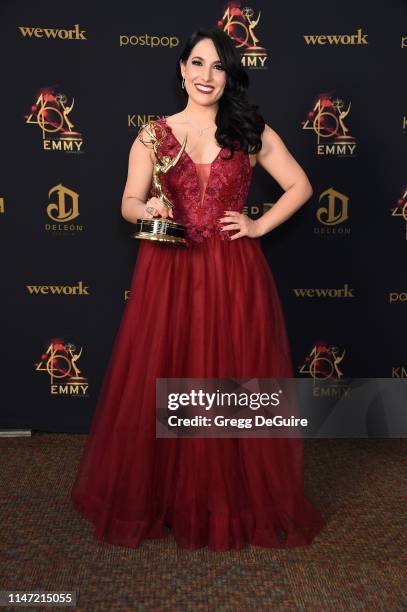 Alejandra Oraa poses with the Daytime Emmy Award for Outstanding Daytime Talent in a Spanish Language Program during the 46th annual Daytime Emmy...