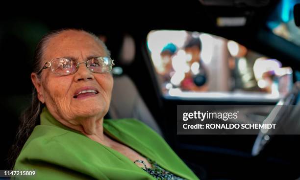 The mother of convicted Mexican drug kingpin Joaquin "El Chapo" Guzman, Maria Consuelo Loera, leaves the US embassy in Mexico City where she arrived...