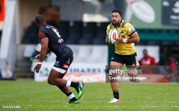 Matt Proctor of the Hurricanes runs with the ball during the Super Rugby match between Cell C Sharks and Hurricanes at Jonsson Kings Park Stadium...