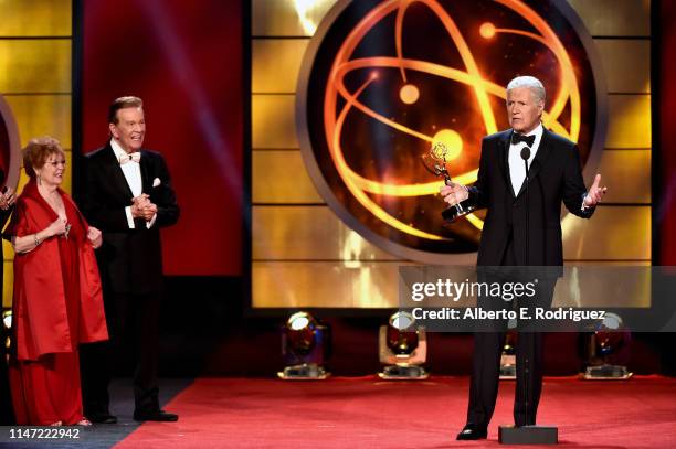 Alex Trebek accepts the Daytime Emmy Award for Outstanding Game Show Host onstageduring the 46th annual Daytime Emmy Awards at Pasadena Civic Center...