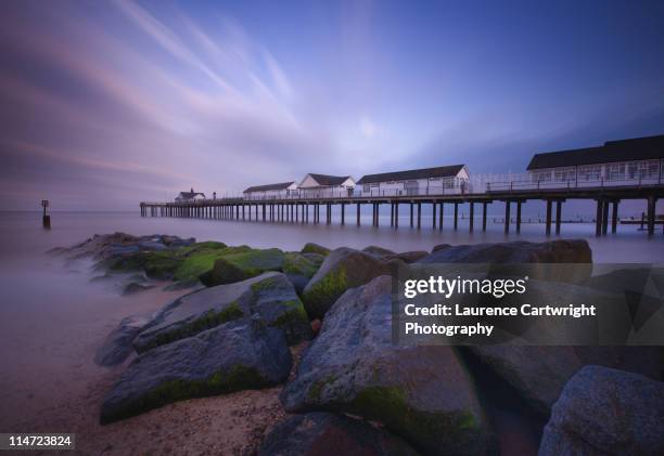 southwold pier at dusk - southwold pier stock pictures, royalty-free photos & images