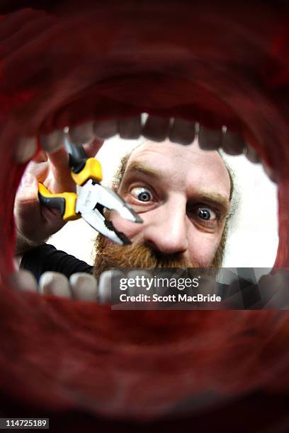 pulling teath - scott macbride stock pictures, royalty-free photos & images