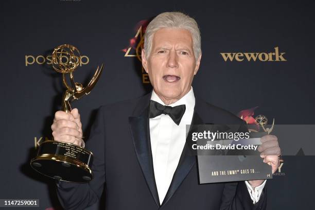 Alex Trebek, winner of the Outstanding Game Show Host award, poses at the 46th Annual Daytime Emmy Awards - Press Room at Pasadena Civic Center on...