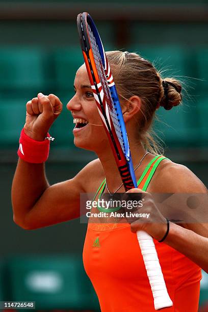 Arantxa Rus of Netherlands celebrates her victory during the women's singles round two match between Arantxa Rus of Netherlands and Kim Clijsters of...
