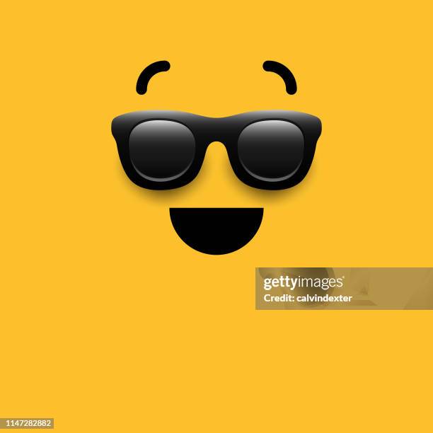 emoji on yellow background - sunglasses emoji stock illustrations