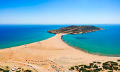 Aerial birds eye view drone photo Prasonisi on Rhodes island, Dodecanese, Greece. Panorama with nice lagoon, sand beach and clear blue water. Famous tourist destination in South Europe