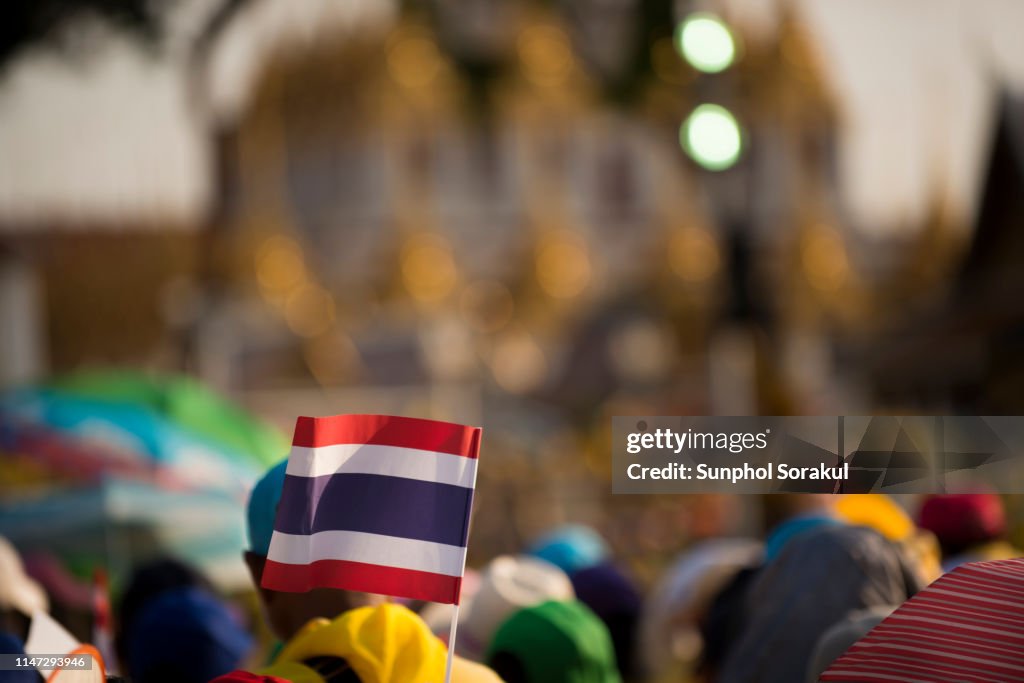 Thai national flag is displayed during royal procession of King Rama X coronation