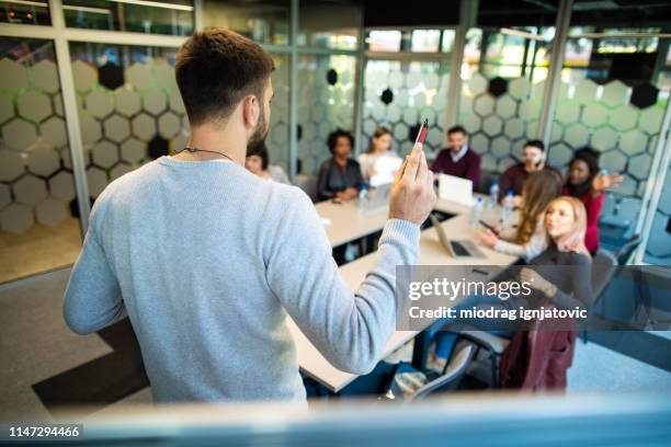 laying out his business plan - working on laptop in train top view stock pictures, royalty-free photos & images