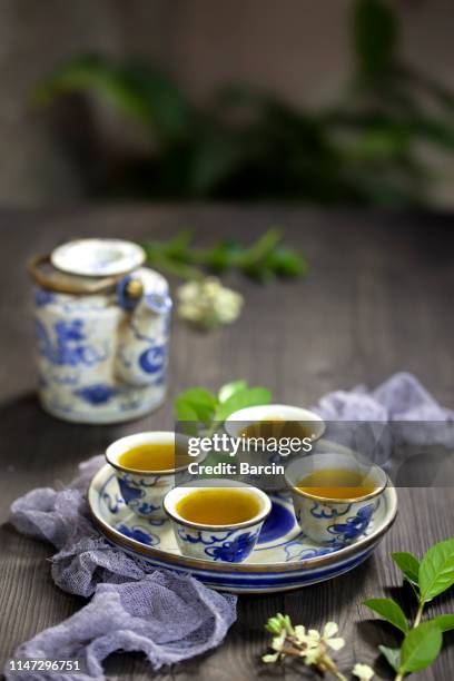 chinese tea and tea set on the table - chinese porcelain stock pictures, royalty-free photos & images