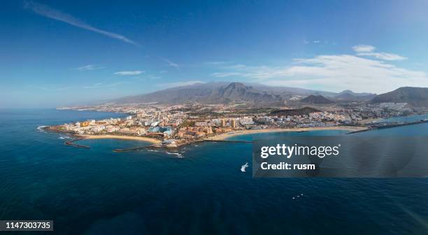 aerial panorama of los cristianos resorts, fuente playa de las vistas and playa del camison beach, tenerife, canary islands, spain. - riviera hotel stock pictures, royalty-free photos & images