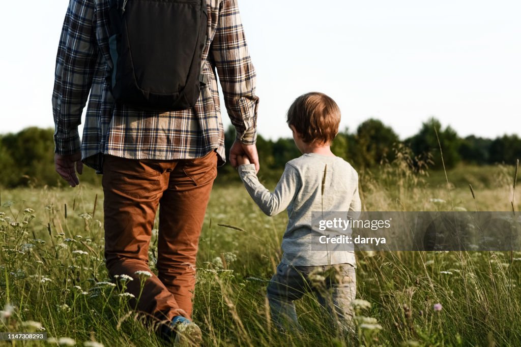 Father and son are traveling together
