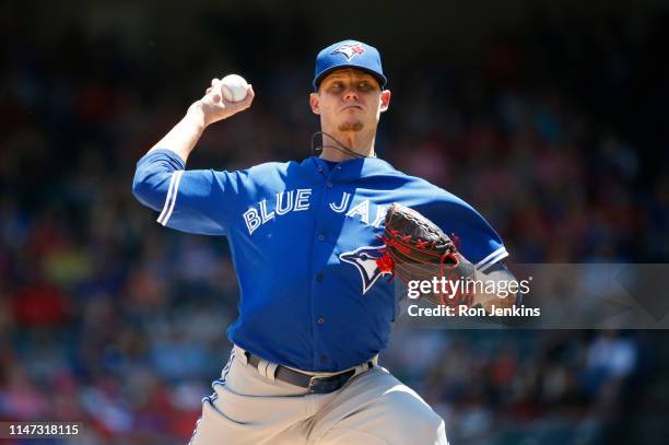 Clay Buchholz of the Toronto Blue Jays throws against the Texas Rangers during the first inning at Globe Life Park in Arlington on May 5, 2019 in...
