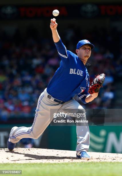 Clay Buchholz of the Toronto Blue Jays throws against the Texas Rangers during the first inning at Globe Life Park in Arlington on May 5, 2019 in...