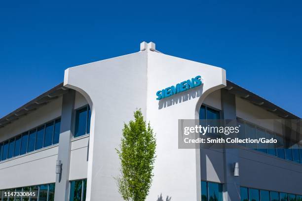 Sign with logo on facade at the Silicon Valley office of technology company Siemens, Mountain View, California, May 3, 2019.