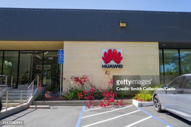 Sign with logo on facade of office of Chinese networking equipment company Huawei in the Silicon Valley, Mountain View, California, May 3, 2019.