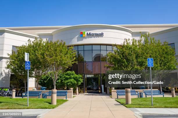 Facade with sign and logo at regional headquarters of computing company Microsoft in the Silicon Valley, Mountain View, California, May 3, 2019.