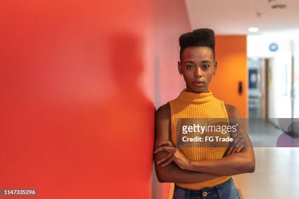 portrait of african young businesswoman - afro hairstyle stock pictures, royalty-free photos & images