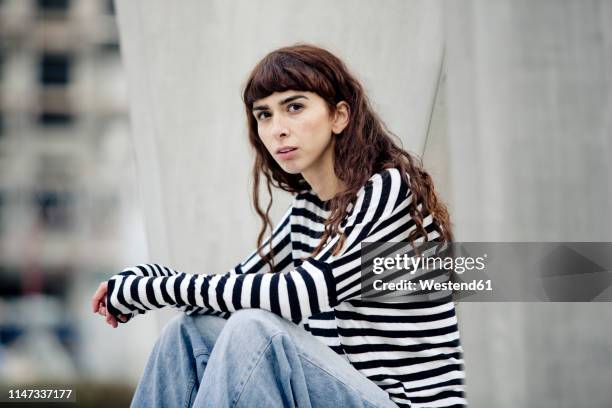 young woman wearing striped shirt - essen ruhrgebiet stock-fotos und bilder