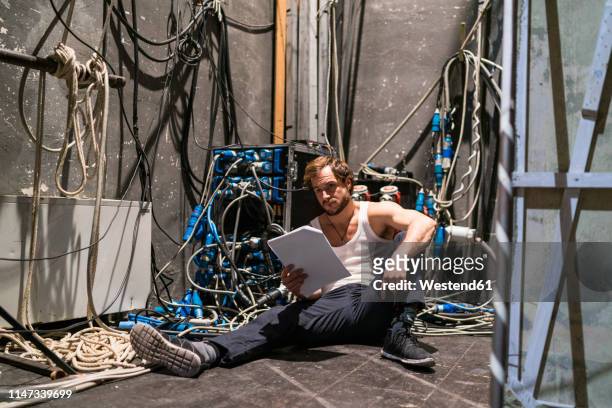 actor with script rehearsing backstage - backstage stock pictures, royalty-free photos & images