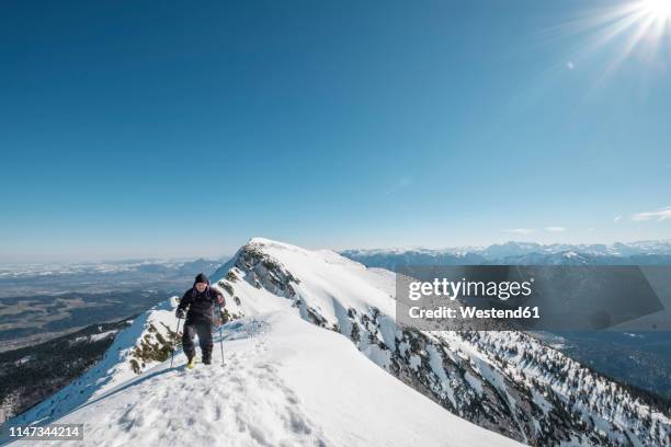 germany, bavaria, gamsknogel, weissbach, chiemgau, senior man hiking in winter landscape - バートライヘンハル ストックフォトと画像