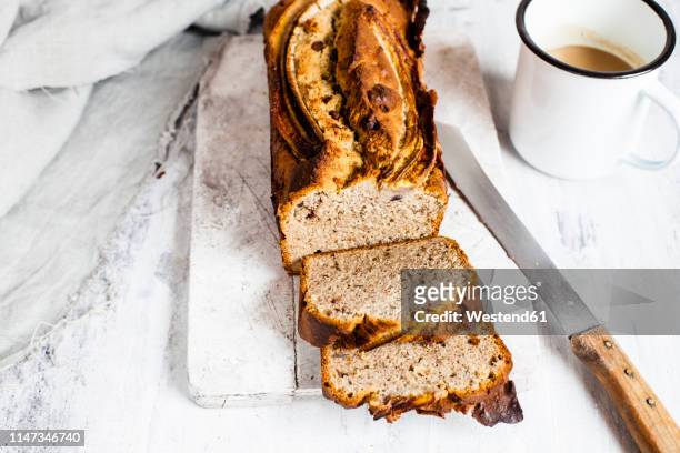 banana bread and cup of coffee - banana loaf stock-fotos und bilder