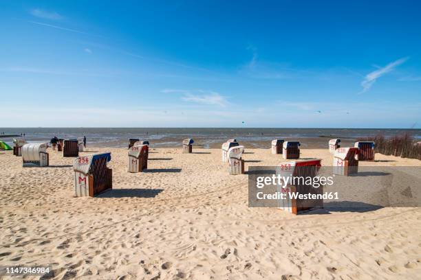 germany, cuxhaven, beach chairs on the beach - cuxhaven stock-fotos und bilder