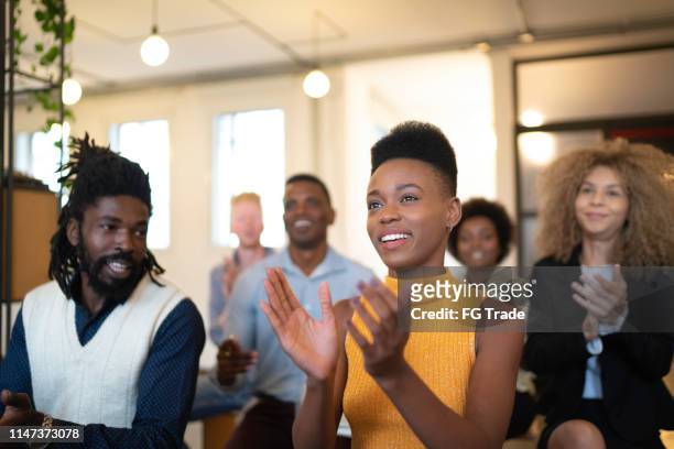 audience applauding a great speaker at business convention and presentation - launch event stock pictures, royalty-free photos & images