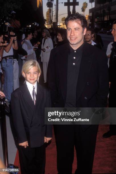 John Travolta and son Jett Travolta attending "Phenomenon" premiere in LA, 1996