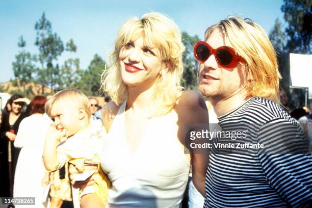 Kurt Cobain with wife Courtney Love and daughter Frances Bean attending the 1993 MTV Video Music Awards at Universal City, CA 09/02/93