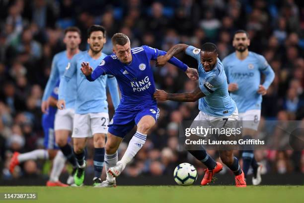 Raheem Sterling of Manchester City takes on Jamie Vardy of Leicester City during the Premier League match between Manchester City and Leicester City...