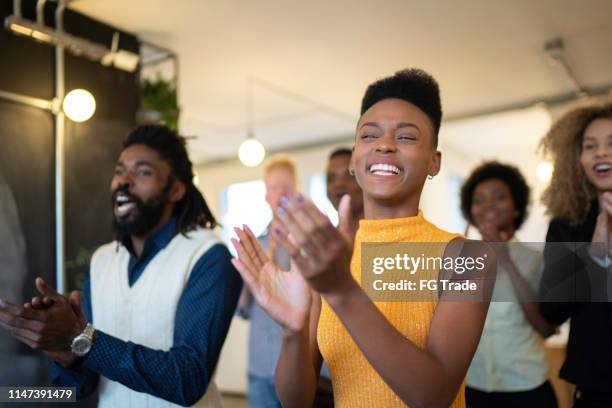 audience applauding a great speaker at business convention and presentation - corporate awards ceremony stock pictures, royalty-free photos & images