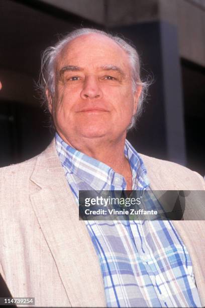 Marlon Brando outside the Los Angeles County Courthouse during his son Christian Brando's murder trial in 1990 Los Angeles, California 7/2/04