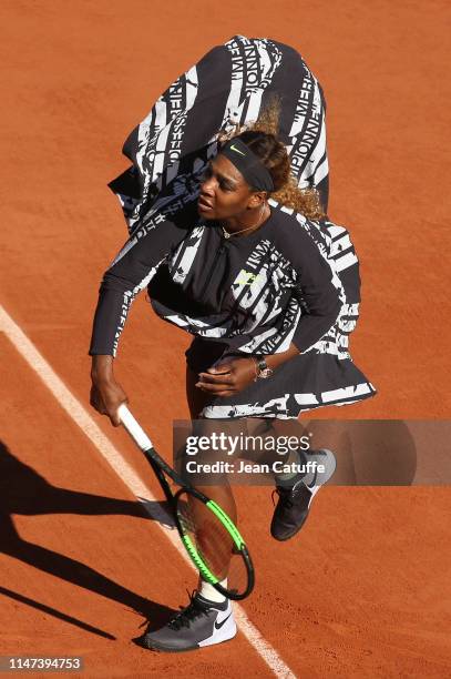 Serena Williams of USA wears a special warm up Nike jacket - with French text reading 'Champion, Championne', 'Queen, Reine', 'Goddess, Deesse' and...